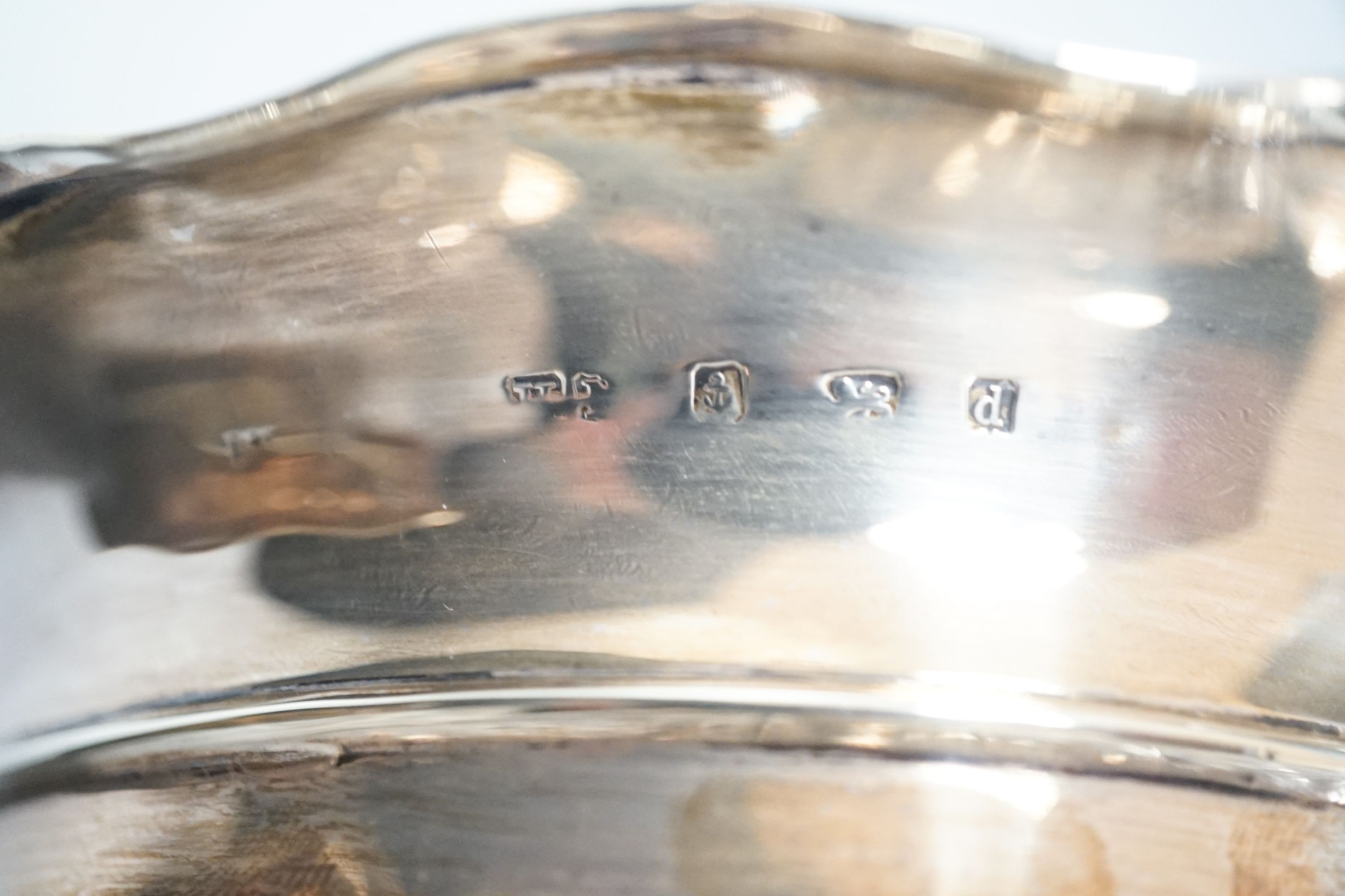 A pair of Edwardian silver mounted glass bowls, (lacking covers), Birmingham, 1904, height 13.4cm.